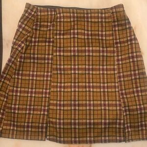 I am selling a yellow, burgundy, yellow and black plaid skirt!!